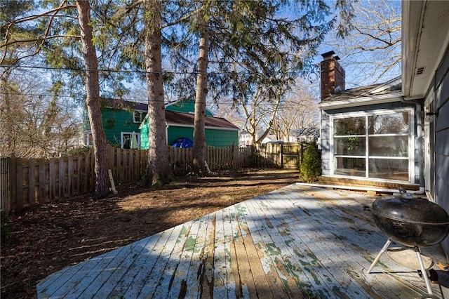 deck featuring a fenced backyard