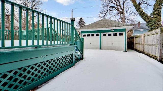 detached garage with fence