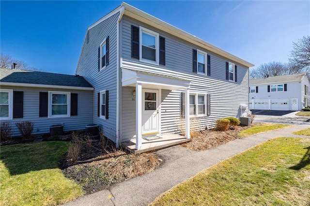 view of front of property with a front lawn