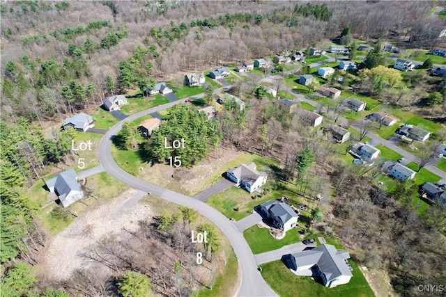 birds eye view of property with a residential view