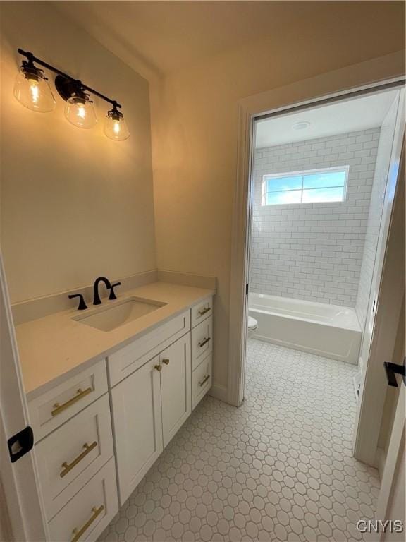 full bathroom with tile patterned floors, shower / bath combination, toilet, and vanity