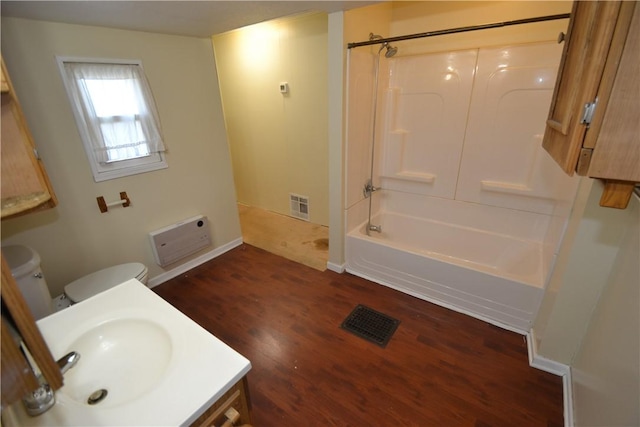 full bathroom featuring visible vents, bathing tub / shower combination, vanity, and toilet