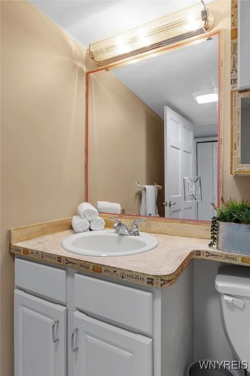 half bath with toilet and vanity