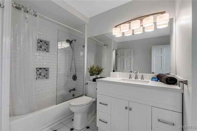 bathroom featuring tile patterned floors, shower / bathtub combination with curtain, toilet, and vanity