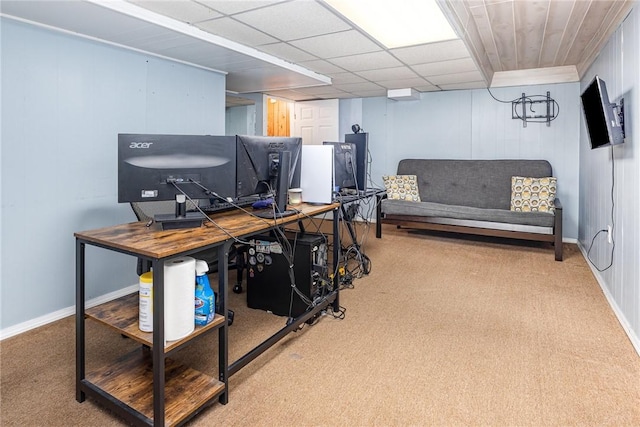 office with a drop ceiling, baseboards, and carpet flooring