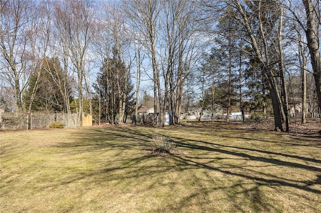 view of yard featuring fence