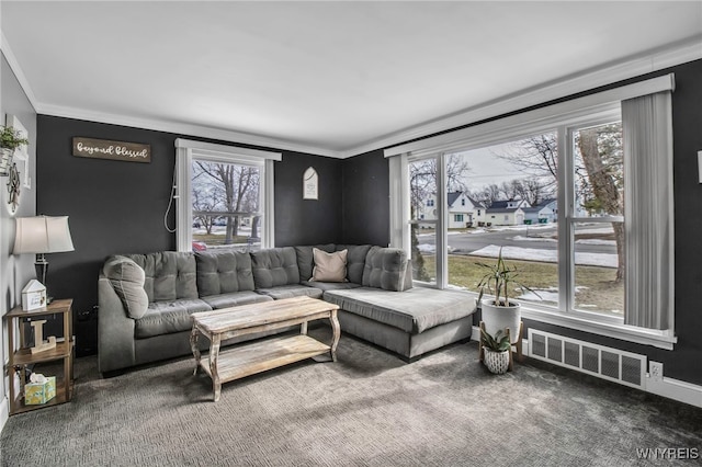 living room featuring crown molding, visible vents, and carpet floors