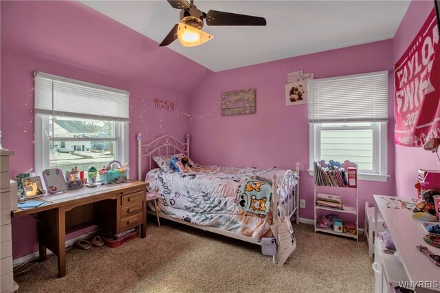 bedroom featuring light carpet, a ceiling fan, and lofted ceiling