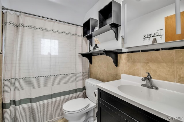 full bathroom with a shower with shower curtain, toilet, tile walls, and vanity