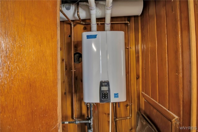 utility room with water heater