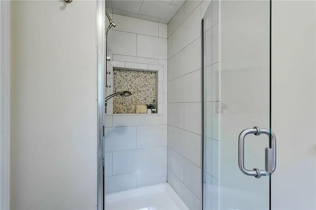 bathroom with a stall shower