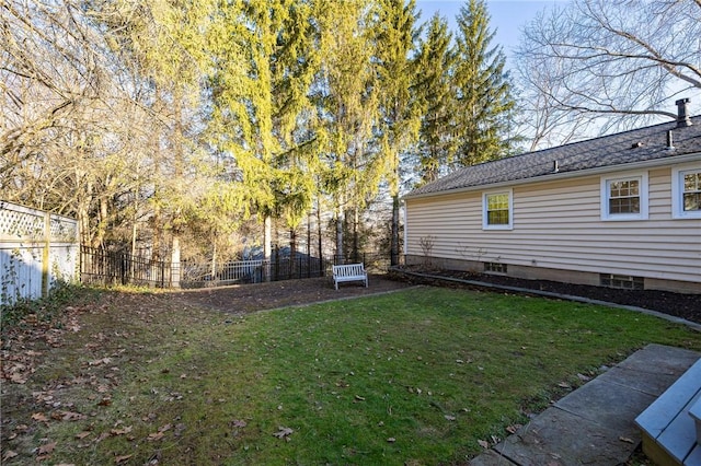 view of yard featuring a fenced backyard