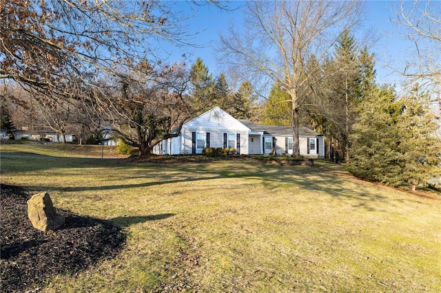 view of front of home with a front lawn