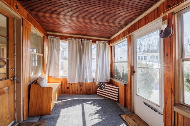 sunroom / solarium with wood ceiling