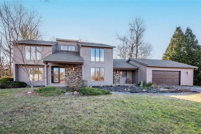 view of front of home with stone siding, a front yard, a garage, and a shingled roof