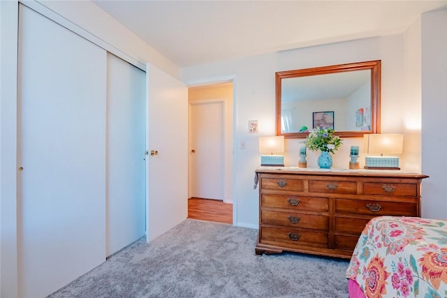 bedroom featuring a closet and carpet floors