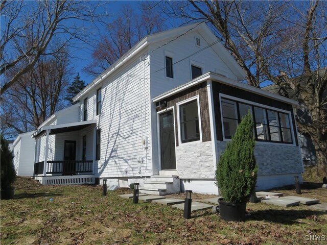 8 1st St, Whitestown, NY 13492 - view of home's exterior with a porch and entry steps