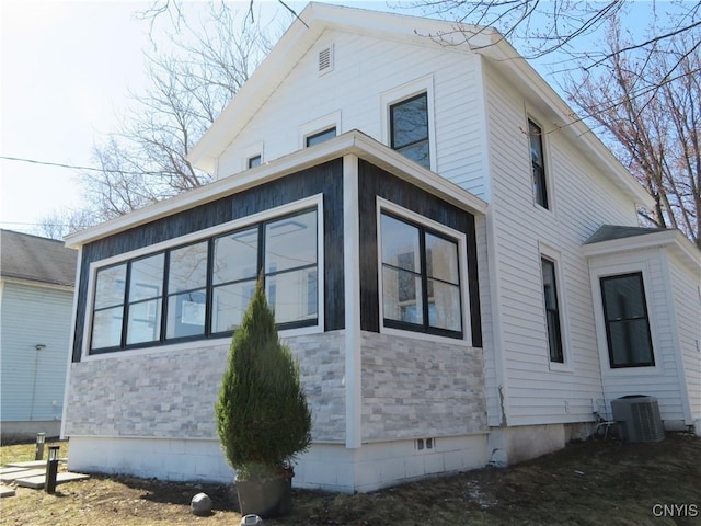 8 1st St, Whitestown, NY 13492 - view of side of home featuring central air condition unit