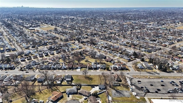 birds eye view of property with a residential view