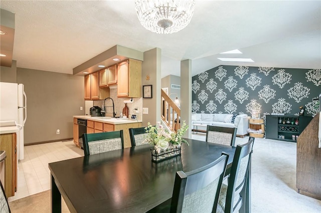 dining space featuring stairway, baseboards, wallpapered walls, an inviting chandelier, and vaulted ceiling