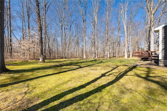 view of yard featuring a deck