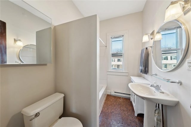 full bathroom featuring toilet, shower / bath combination, and a baseboard radiator