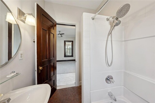 bathroom with shower / tub combination