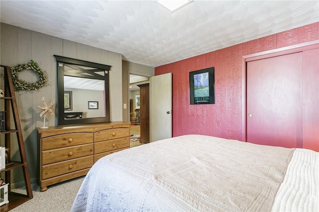 bedroom featuring a closet and carpet