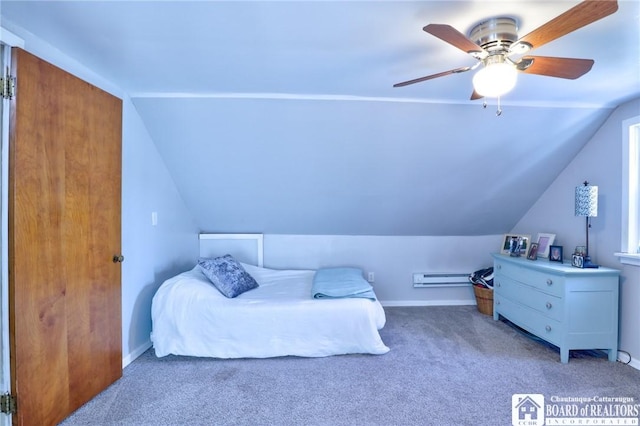 bedroom with a ceiling fan, vaulted ceiling, carpet, and a baseboard radiator