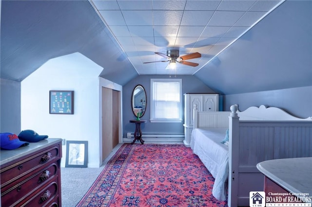 bedroom featuring a ceiling fan, baseboards, vaulted ceiling, a baseboard heating unit, and carpet flooring