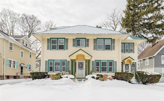 view of front of home featuring metal roof