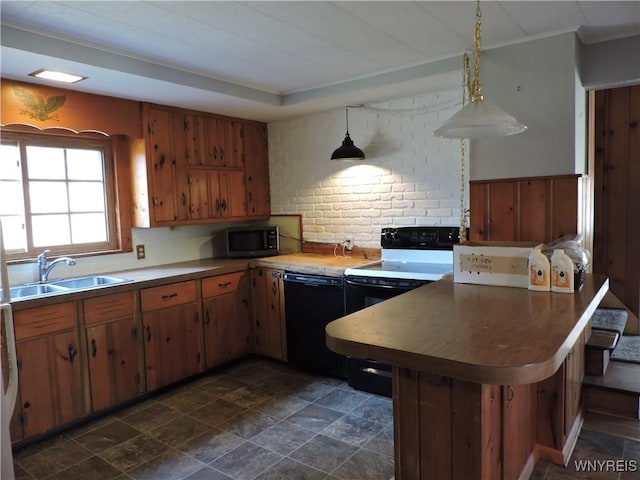 kitchen featuring a sink, stainless steel microwave, dishwasher, and decorative light fixtures