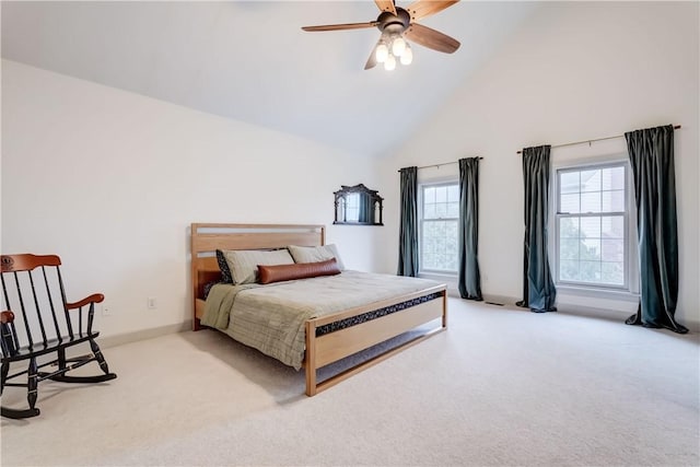 bedroom with a ceiling fan, high vaulted ceiling, and carpet flooring