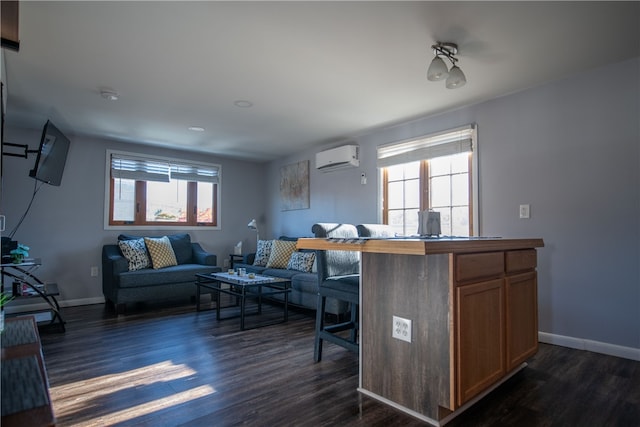 living area featuring plenty of natural light, baseboards, and dark wood-style flooring