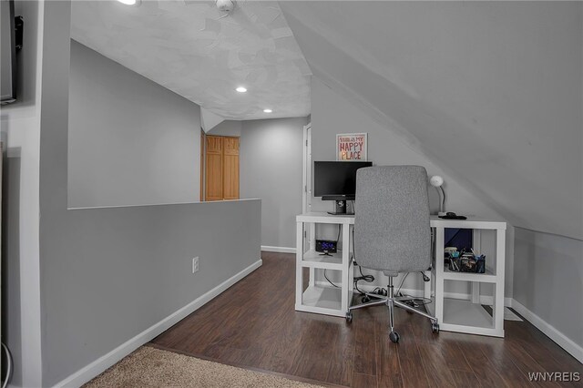 home office with recessed lighting, lofted ceiling, baseboards, and wood finished floors