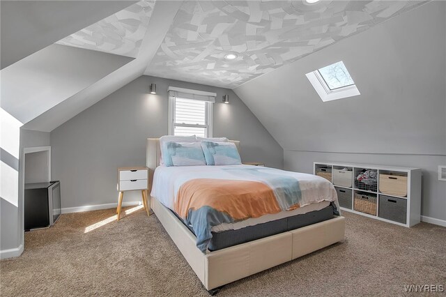 bedroom featuring vaulted ceiling, carpet, and baseboards