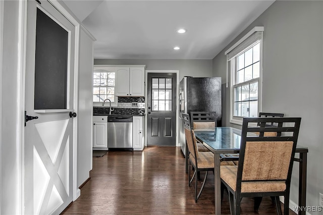 dining area featuring recessed lighting and dark wood-style flooring