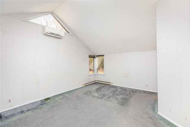 additional living space featuring baseboards, carpet floors, a baseboard radiator, vaulted ceiling, and a wall mounted air conditioner