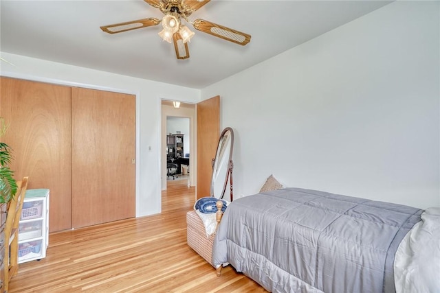 bedroom featuring light wood-type flooring and ceiling fan