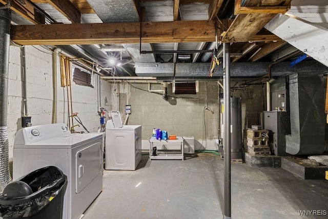 unfinished basement with washer and dryer and water heater