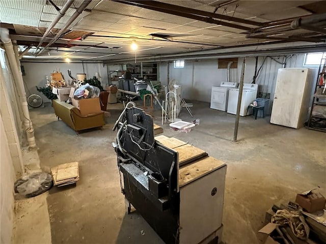 basement featuring separate washer and dryer