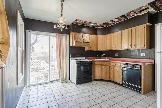 kitchen featuring a sink, hanging light fixtures, dishwasher, gas range, and a chandelier