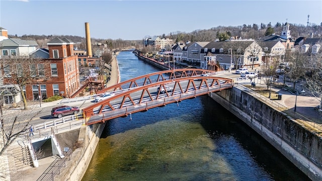 view of dock with a pier and a water view