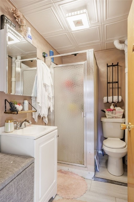 bathroom featuring an ornate ceiling, vanity, and a stall shower