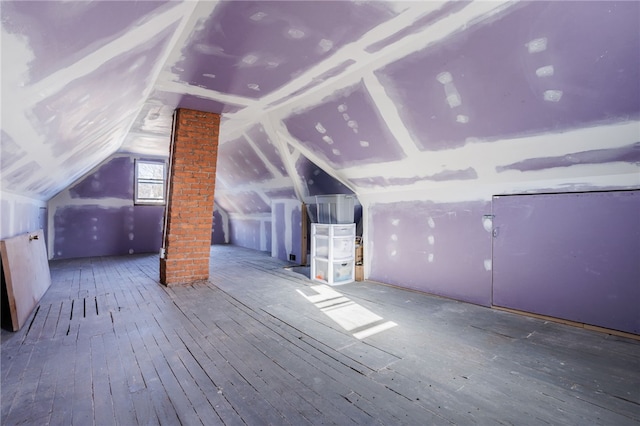 additional living space with lofted ceiling