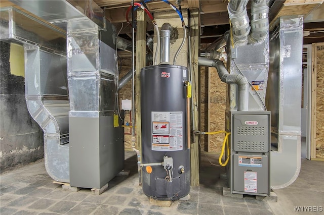 utility room featuring gas water heater and heating unit