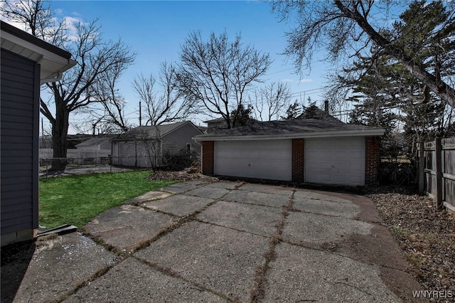 detached garage with fence