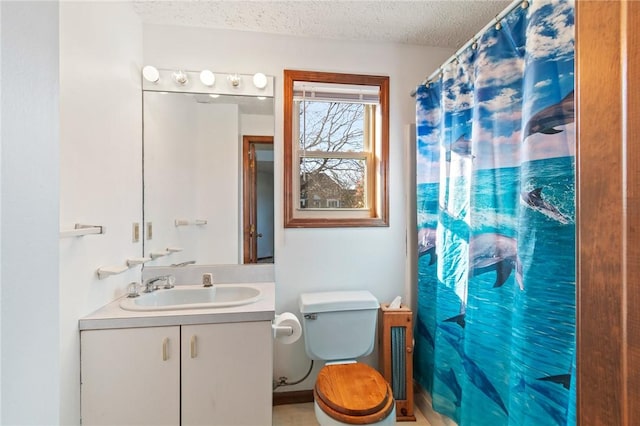 full bathroom with vanity, toilet, a shower with curtain, and a textured ceiling