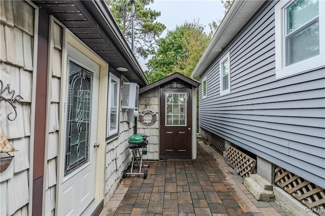 doorway to property featuring a patio area