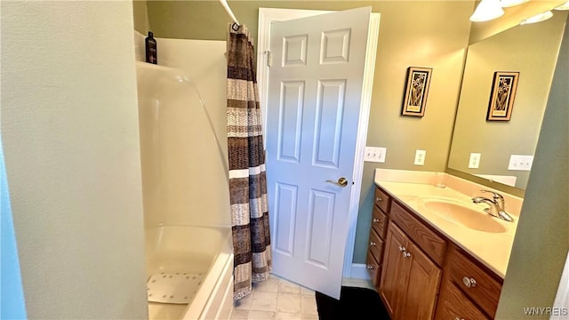 bathroom featuring tile patterned floors, vanity, and a shower with shower curtain